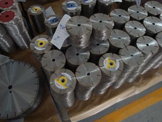Stacks of finished segmented diamond saw blades